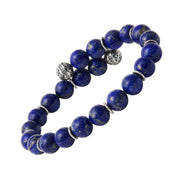 Lapis lazuli beaded stretch bracelet with engraved sterling silver filigree ball and twisted rondelle accents.