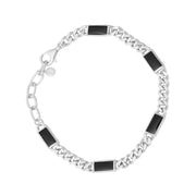 Sterling silver curb chain bracelet with inlaid black onyx rectangular stations and an adjustable lobster clasp.