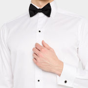 : Man wearing sterling silver black onyx LOVE round cufflink on white French cuff by Jan Leslie