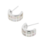 Sterling silver white mother-of-pearl grid huggie hoop earrings pair angled view showing luminous white MOP tile grid and polished silver frame by Jan Leslie