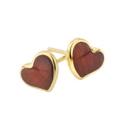 Angled view of tiger's eye heart inlay gold bezel stud earrings showing stone grain — Jan Leslie