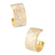 Close-up side profile of woman wearing gold vermeil sterling silver wide-band white mother of pearl floral lattice huggie hoop earrings Jan Leslie