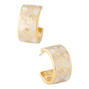 Angled staggered pair of gold vermeil sterling silver wide-band white mother of pearl floral lattice open C-hoop earrings showing iridescent shell inlay with gold quatrefoil overlay pattern, Jan Leslie