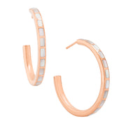 Pair of large rose gold hoop earrings with segmented white mother of pearl tile inlay along the front and post back.