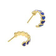 Gold hoop earrings lined with bezel-set lapis lazuli hearts 