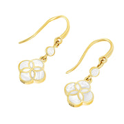 18K gold vermeil white mother-of-pearl petal Seed of Life drop earrings leverback variant pair angled view showing polished gold leverback wire small round white MOP accent stone and quatrefoil clover pendant with Seed of Life gold lattice over luminous white MOP by Jan Leslie