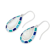 Sterling silver teardrop drop earrings with white mother-of-pearl center and cobalt teal blue enamel mosaic border by Jan Leslie.
