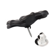 Matte black sculpted four-petal flower lapel pin with crystal center showing engraved petal detail and pin-back closure by Jan Leslie.