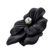 White pearl sculpted flower lapel pin with crystal center front view showing full petal silhouette by Jan Leslie.