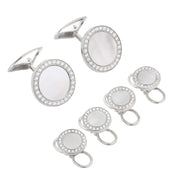 Silver round mother of pearl and crystal halo tuxedo cufflink and stud set with bullet backs.