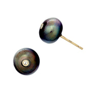 Tahitian black pearl stud earrings with bezel-set diamond accent on 14K gold post. Peacock iridescence, baroque beauty. Jan Leslie.