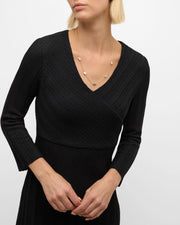Model in tan dress wearing green malachite five-heart station gold necklace — Jan Leslie