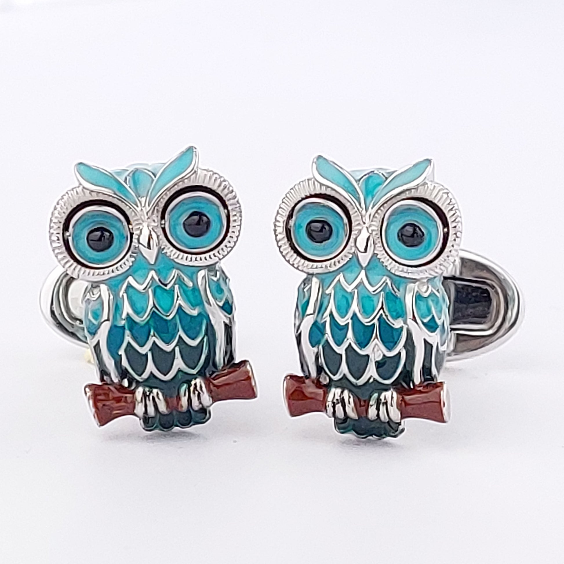 Sculpted enamel owl cufflinks in sterling silver with black crystal eyes and whale-back closure