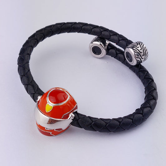 Black braided leather bracelet with a sterling silver red and yellow enamel racing helmet charm and an engraved magnetic clasp closure.