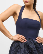 Channel-set tiger's eye square tile gold vermeil hinged bangle bracelet worn on model's wrist