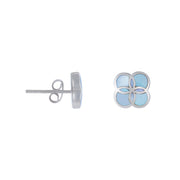 Sterling silver quatrefoil flower stud earrings with blue mother of pearl enamel inlay and butterfly back.