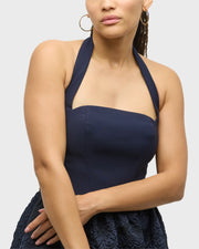 Model wearing large gold hoop earrings with multicolor enamel bar inlays — Jan Leslie