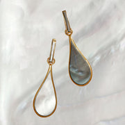 Mismatched open teardrop outline in white mother of pearl and filled dark charcoal mother of pearl drop earrings 