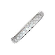 Rectangular hinged bangle with overlapping fan-scale pattern filled with bright white enamel