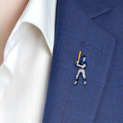 Male model wearing the Enamel Baseball Player Sterling Silver Lapel Pin on a blue sports jacket. 