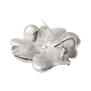 Hallmarked 925 sterling silver large daisy flower brooch with a brushed texture finish and a secure double-locking pin clasp backing.