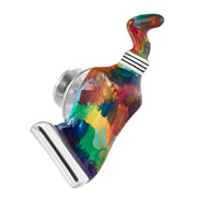 Sterling silver multicolor swirl resin paint tube lapel pin angled view showing whale-back closure and rainbow swirl resin detail by Jan Leslie