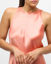 Woman wearing 18K gold vermeil white mother-of-pearl heart pendant necklace showing