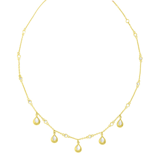 Delicate gold chain necklace featuring dangling teardrop charms and bezel-set mother-of-pearl stations 