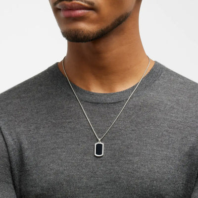 Male model wearing the Black Onyx Gemstone Plaque Sterling Silver Pendant Necklace. 