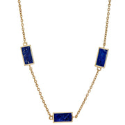 Gold cable chain station necklace with three rectangular lapis lazuli stones in gold bezel settings.