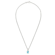 Oval blue topaz solitaire pendant on a long braided sterling silver wheat chain with gold vermeil.