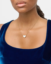 old vermeil bezel-set white mother-of-pearl heart pendant necklace on cable chain showing full silhouette by Jan Leslie.