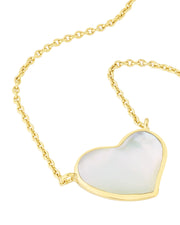 Gold vermeil bezel-set white mother-of-pearl heart pendant on cable chain showing iridescent stone surface by Jan Leslie.