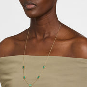 Model wearing gold vermeil five-station rectangular malachite necklace on long cable chain by Jan Leslie.