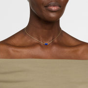  Model wearing lapis lazuli bar pendant necklace on gold rolo chain by Jan Leslie.