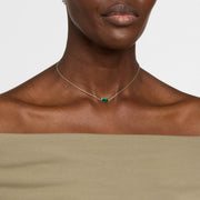Model wearing malachite bar pendant necklace on gold rolo chain by Jan Leslie.
