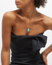 Freeform polished turquoise horn pendant necklace on oxidized sterling silver braided wheat chain