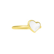 Angled view of gold vermeil sterling silver single white mother of pearl heart solitaire ring with bezel-set iridescent stone and slim polished yellow gold band, Jan Leslie luxury women's fine jewelry.