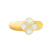 Angled front view of gold vermeil sterling silver slim band white mother of pearl floral lattice quatrefoil ring showing iridescent shell inlay with gold petal overlay and engraved JL Jan Leslie