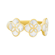 Angled front view of gold vermeil sterling silver wide band three-motif white mother of pearl floral lattice quatrefoil ring showing three repeating iridescent shell inlay petal cluster stations on polished tapered band, Jan Leslie 