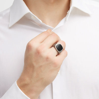 Male model wearing the Cross Etched Black Onyx Sterling Silver Ring. 