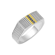 Two-tone sterling silver men's signet ring with a textured grid face, gold bar accents, and a row of pavé black diamond stones — a bold, sophisticated statement for the modern gentleman.