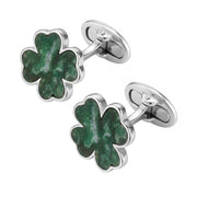 Four-leaf clover cufflink pair with deep forest green onyx inlay 