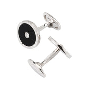 Angled view of black onyx and CZ round cufflinks in sterling silver with toggle bar closure — Jan Leslie