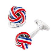 Sterling silver navy and turquoise enamel love knot cufflinks pair showing three-dimensional knot form and whale-back closure by Jan Leslie.