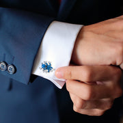 Blue glitter enamel octopus cufflink with black enamel eyes and polished silver tentacles on cuff, Jan Leslie