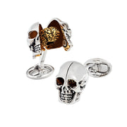 Pair of sterling silver 3D skull cufflinks with hinged top opening to reveal detailed gold brain interior, shown with skull cap open and closed, oval swivel backs