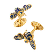 Old vermeil navy blue enamel bee cufflinks pair front view showing detailed wing venation striped body and teal crystal eyes by Jan Leslie.
