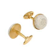 Hand-carved floral mother-of-pearl cufflinks in a polished gold bezel