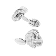 Sterling silver ribbed love knot cufflinks with rope-textured interlocking swirl face and oval toggle back closure, luxury men's fine jewelry.